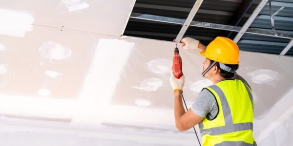 construction-workers-using-electric-drill-are-install-ceiling-house-building-construction-ceiling-installation-ideas_61243-1131