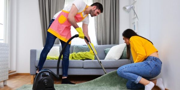 relationship-married-life-household-works-duties-gender-equality-concept-man-cleaning-while-woman-is-assisting-him_378362-88