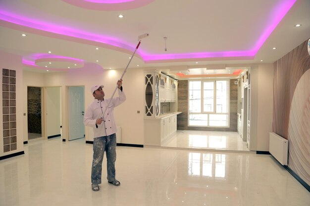 house-painting-man-painting-ceiling-house_923301-4